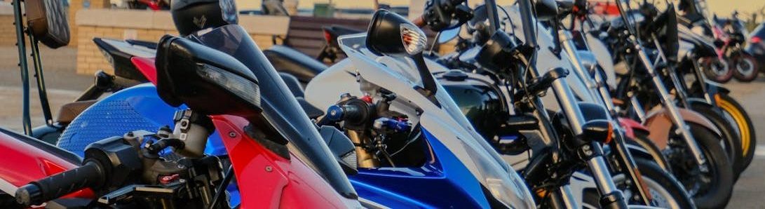 Line of motorcycles parked by the seaside in Herne Bay, England.